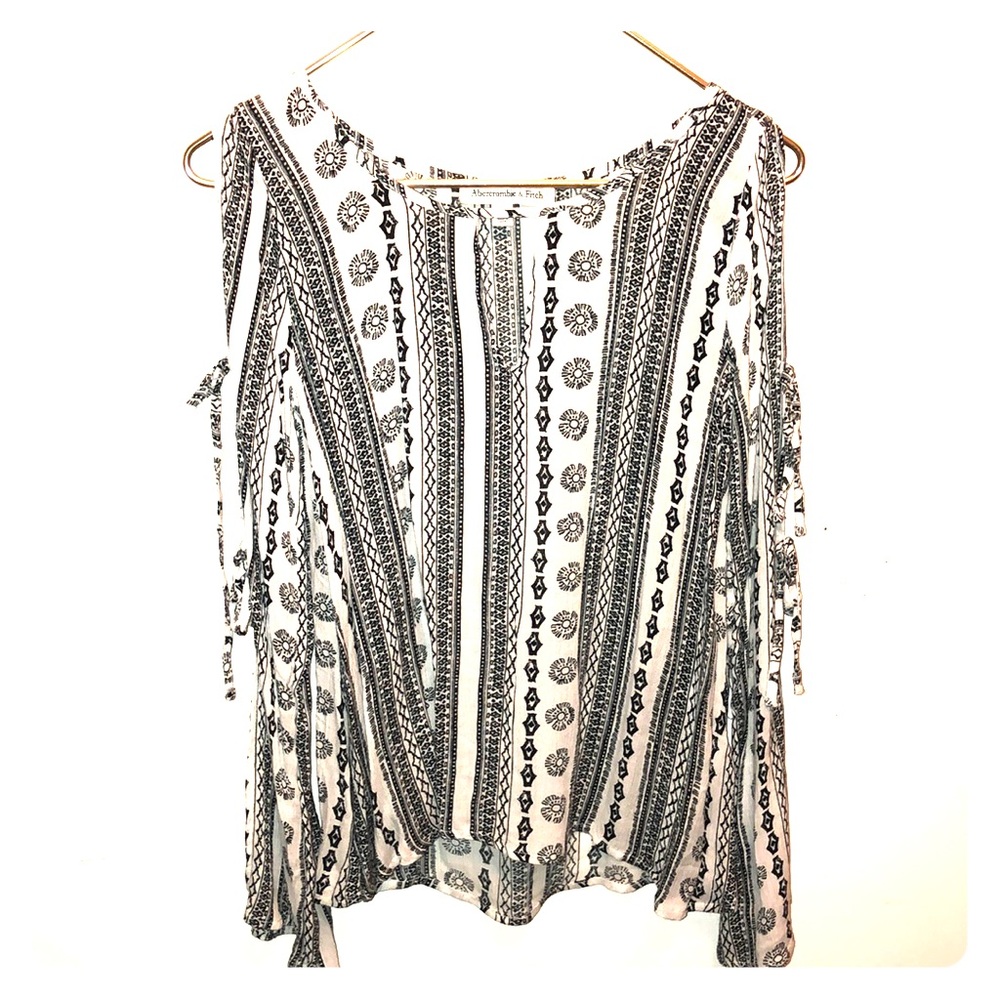 Black and white long sleeve tie up on arms